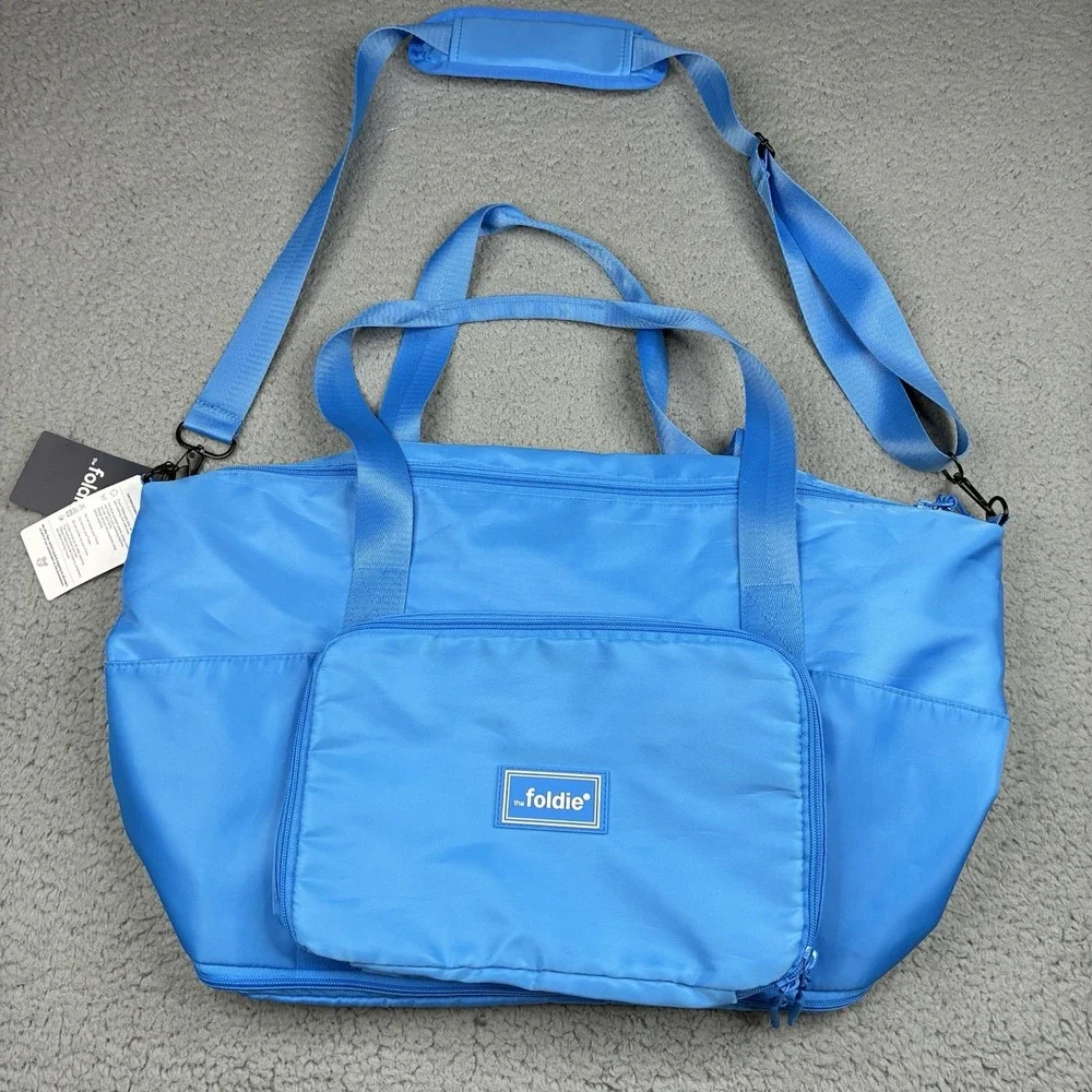 The Foldie 40L Travel Bag Carry On Expandable Azure Blue Weekender Tote NWT